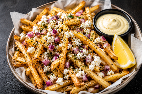 Greek fries with feta, red onion and spices